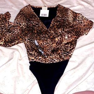 Cheetah print bodysuit brand new with tags! Could be leopard print ☺️